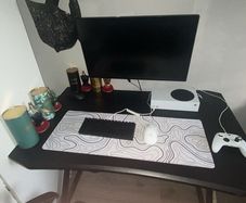 Gaming table with cup holder and headset holder
