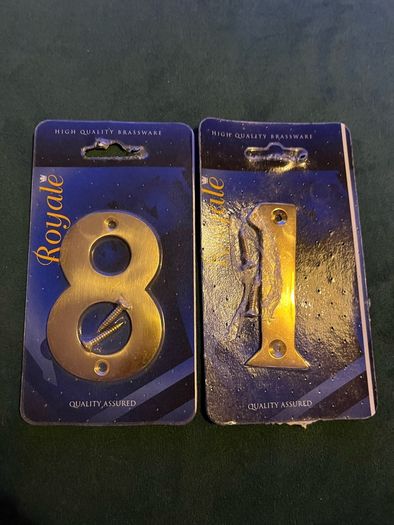 Vintage brass door numbers