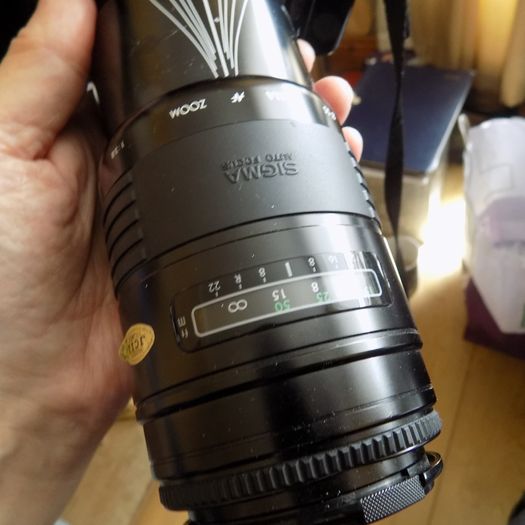 Old heavy Olympus OM101 Camera with lens.