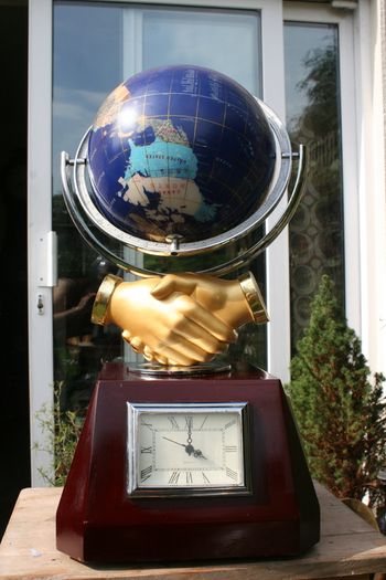 Vintage  Stone  global shape turnable 3 sides with clock, thermometer and hydrometer H 21"