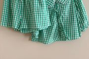 Marks and Spencers girls  green and white gingham shorts and tie-front top set.