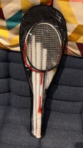 2 badminton rackets with net.