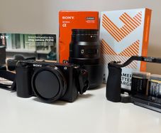 Sony ZVE-10 + Sony E 18-105mm f/4 lens (cage and 5 batteries)