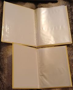 2 Photo albums fitting 24 photos each