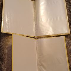 2 Photo albums fitting 24 photos each