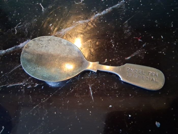 Edwardian fiddle back advertising caddy spoon