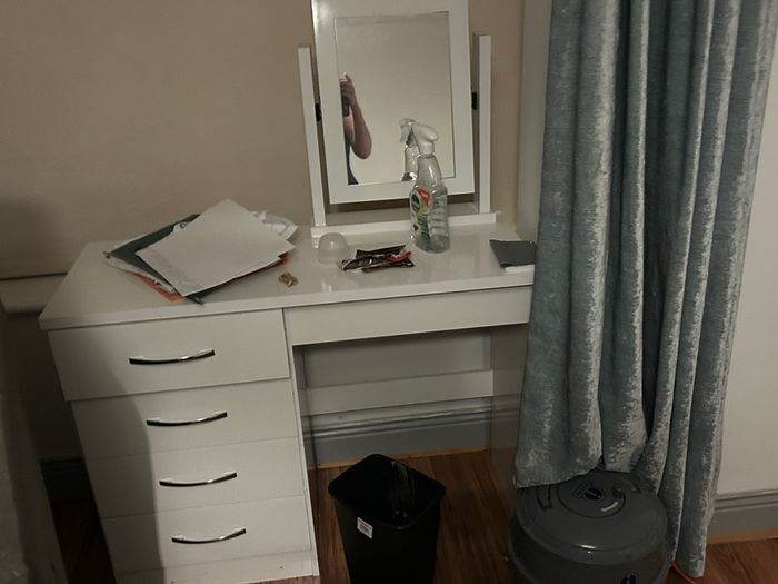 Woman's make up dressing table with chair and mirror