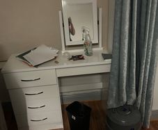 Woman's make up dressing table with chair and mirror