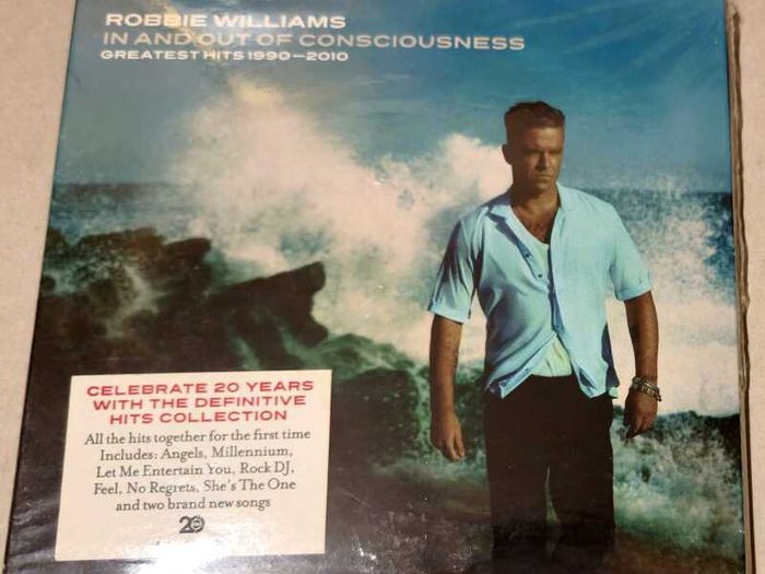 2 CD's Robbie Wiliams - Greatest hits 1990-2010, New, Unopened.