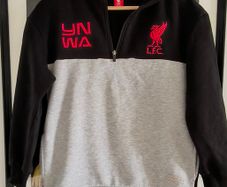 Liverpool sweatshirt age 12. Pockets