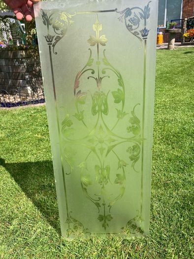 Acid etched glass panel
