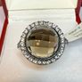 A beautiful silver ring with smokey quartz and white topaz. Image 2