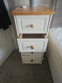 pair of cream bedside lockers
