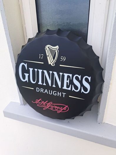 Guinness  bottle top metal sign