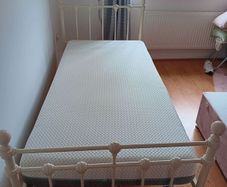 Single metal bed with mattress