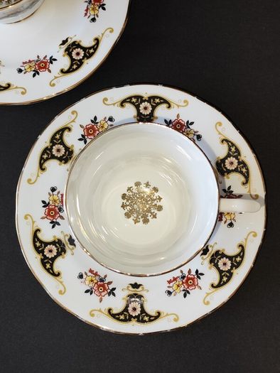A Pair of Royal Sutherland Bone China Teacups and Saucers in the Balmoral Pattern