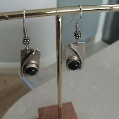 Bespoke sterling silver drop earrings with blue topaz