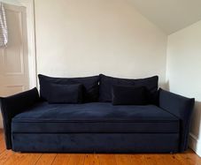 Navy velvet couch with matching Ottoman. Perfect condition