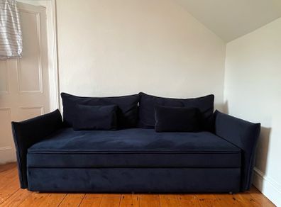 Navy velvet couch with matching Ottoman. Perfect condition