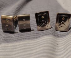 Cufflink pairs with embedded gems