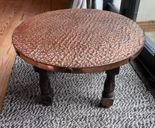 Mid century round copper top coffee table