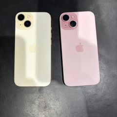 2 iPhone 15 for sale (pink and yellow, price per phone)
