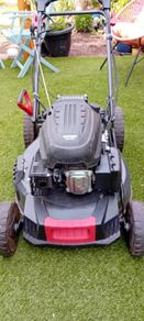 petrol  lawn like new