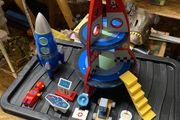 toy rocket and rocket money box