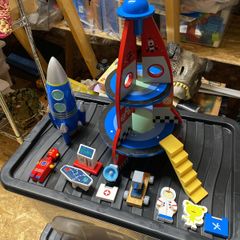 toy rocket and rocket money box