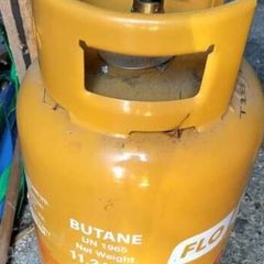 3/4 full butane gas cylinder