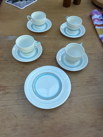 Blue handpainted cups, saucers and plates ( 4 each)