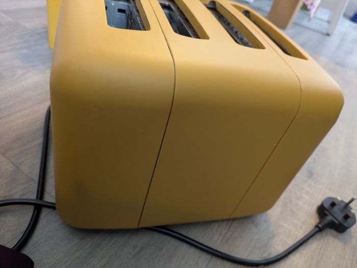 Mustard yellow 4 slice toaster and bread bin