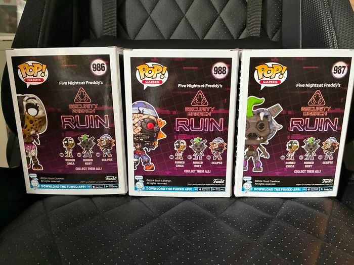 Five Nights at Freddys plushies and dragon figures