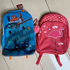 Two NEW school bags. Disney Planes pull along. Pink Flamingo back pack.