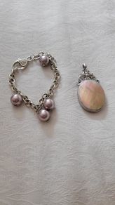 silver bracelet and pendant