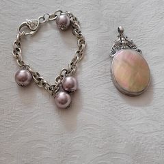 silver bracelet and pendant