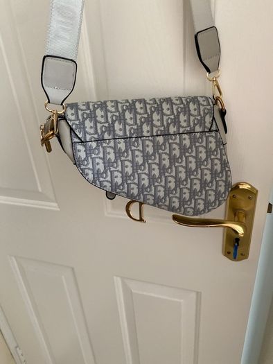 Beautiful inspired grey cross overt bag