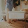 A sleek Babybjorn cradle that gently and silently rocks to soothe your baby. Image 3