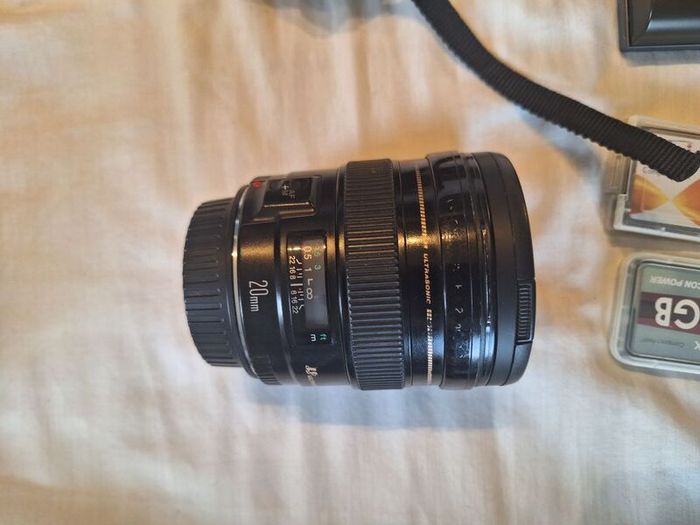 canon camera and pro lenses and a Pentax film system