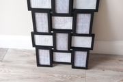 Black Picture frame. Holds 12 pictures