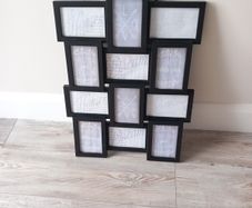 Black Picture frame. Holds 12 pictures