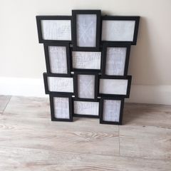 Black Picture frame. Holds 12 pictures