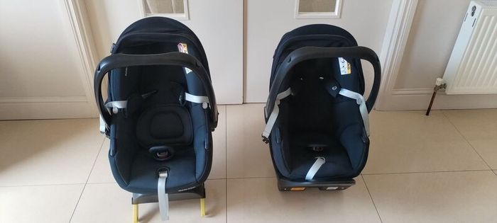 Two great condition car seats with Isofix bases