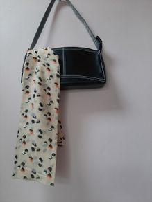 New bag and scarf tags attached