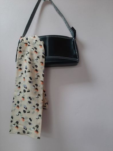 New bag and scarf tags attached