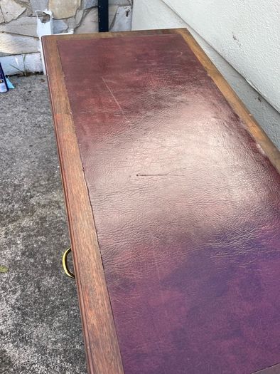 Maghoney wine leather desk with 2 drawers. Inlaid