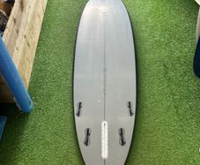 Second Hand Mark Phipps Surfboards 7'2 One Bad Egg Black Rails Grey Deck and Bottom FCS II Sides in