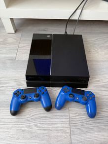 PlayStation 4 Console + 2 Blue Controllers