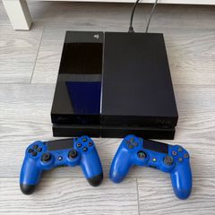 PlayStation 4 Console + 2 Blue Controllers