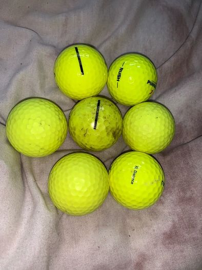 (7) Yellow colored golf ball